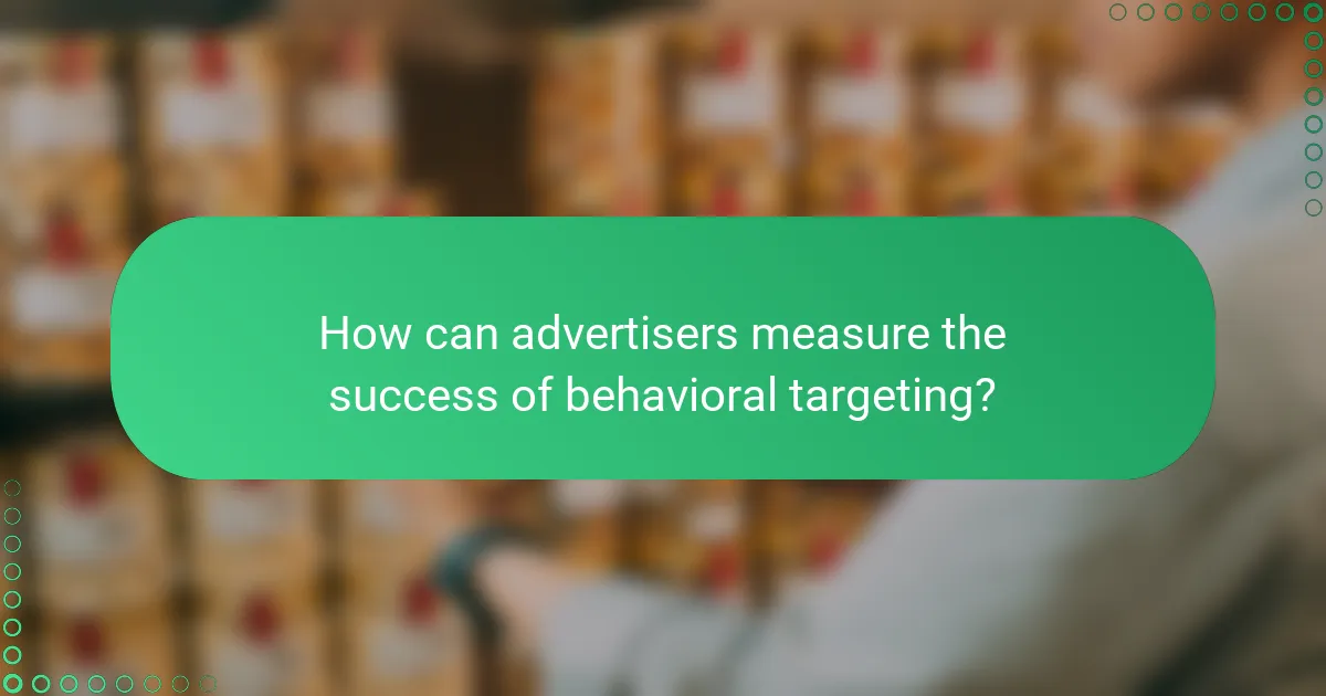 How can advertisers measure the success of behavioral targeting?